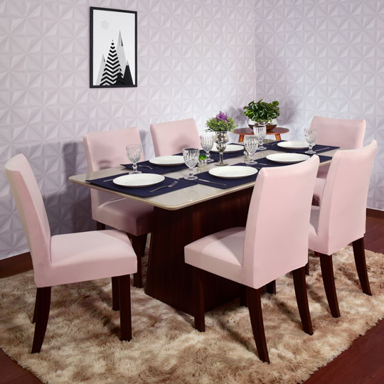 mesa de jantar com cadeiras com capas spandex rosê