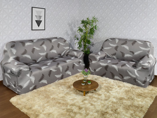 capa de sofá estampada com cores neutras