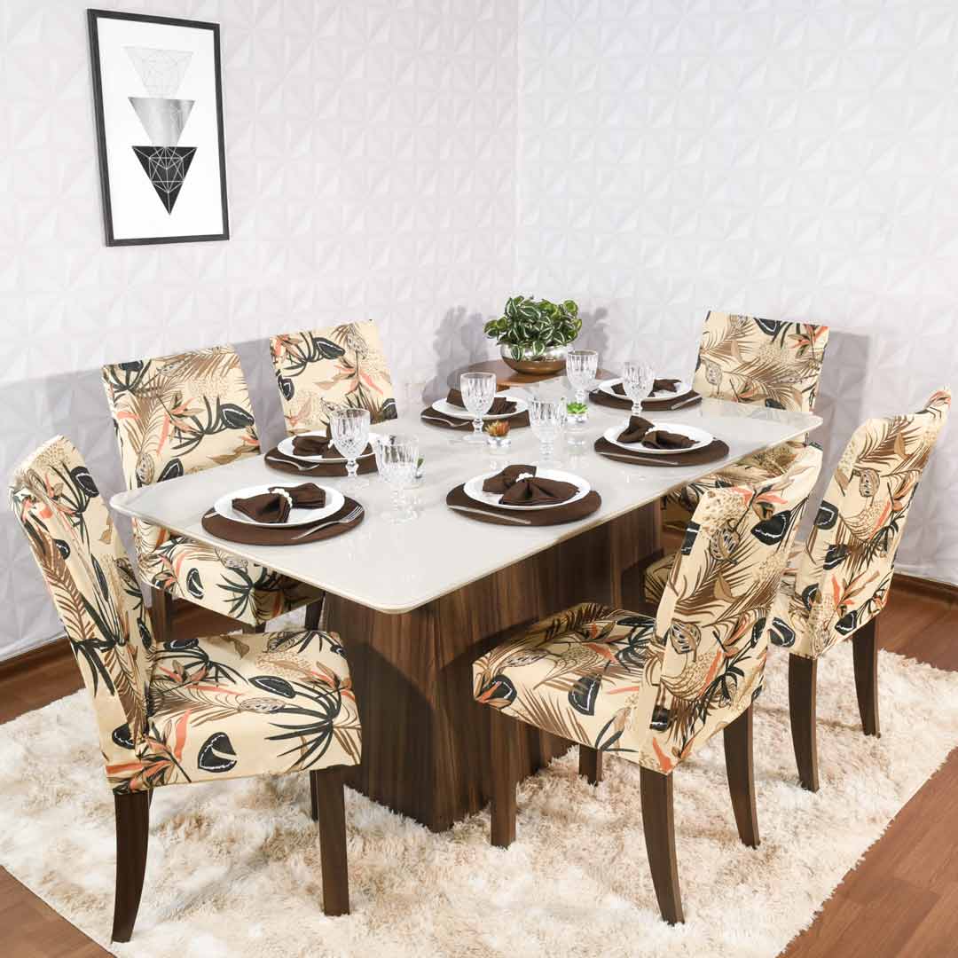 mesa posta marrom com sousplats e guardanapos de tecido e capa de cadeira