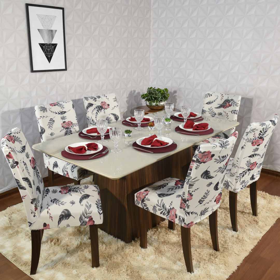 mesa posta com sousplat e guardanapo de tecido marsala e capa de cadeira de jantar floral